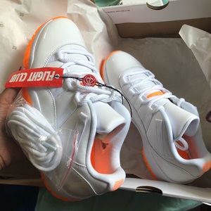 Air Jordan 11 Low WMNS 
“Bright Citrus”